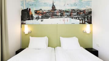 Skrivbord, mörkläggningsgardiner, gratis wi-fi och sängkläder