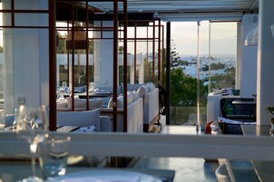 Breakfast, lunch, dinner served; Mediterranean cuisine, pool views 