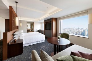 Habitación, 1 cama de matrimonio grande, no fumadores | Minibar, caja fuerte, escritorio y cortinas opacas