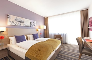Comfort Twin kamer | Hypoallergeen beddengoed, een minibar, een kluis op de kamer, een bureau