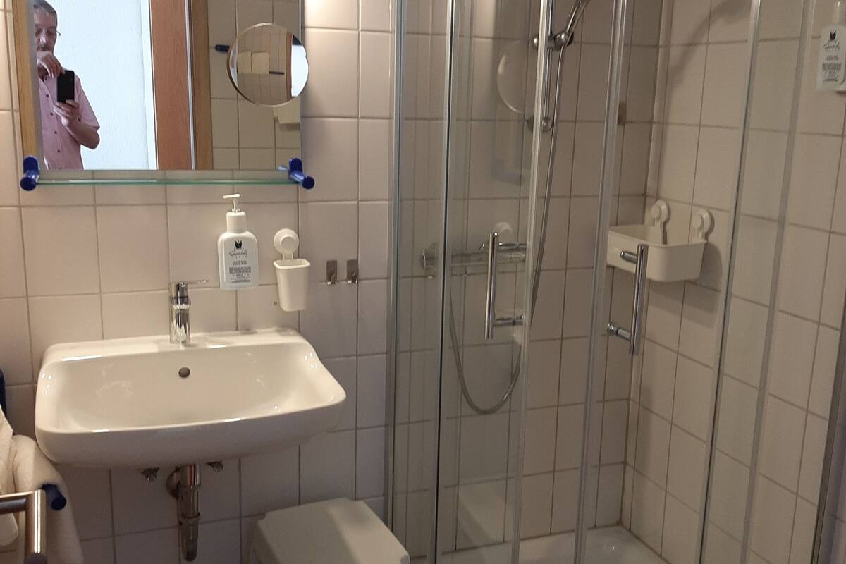 shower, free toiletries, hair dryer, towels