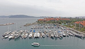 Guests can enjoy stunning marina views from the adjacent hotel.