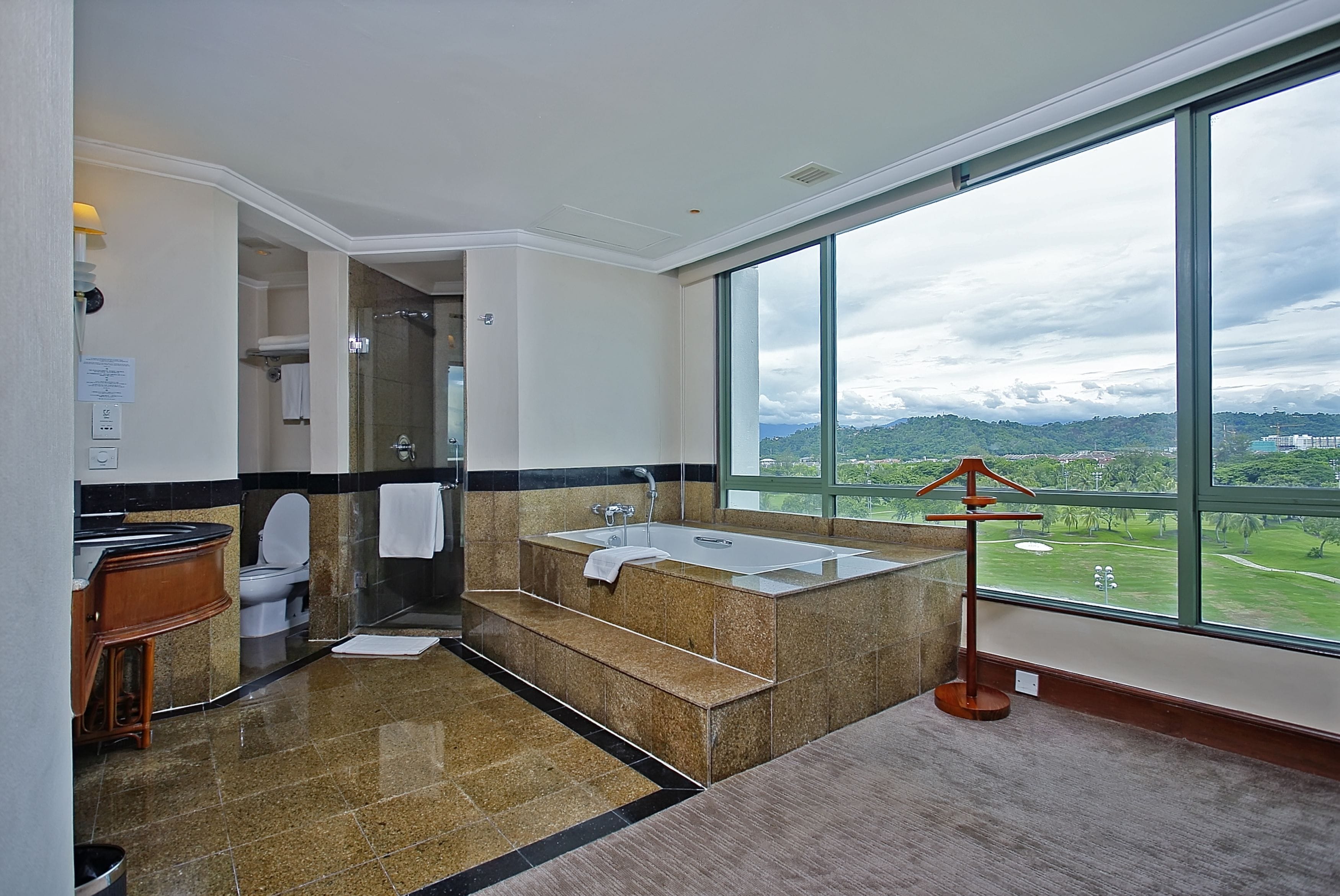 separate bathtub and shower, deep-soaking bathtub, rainfall showerhead