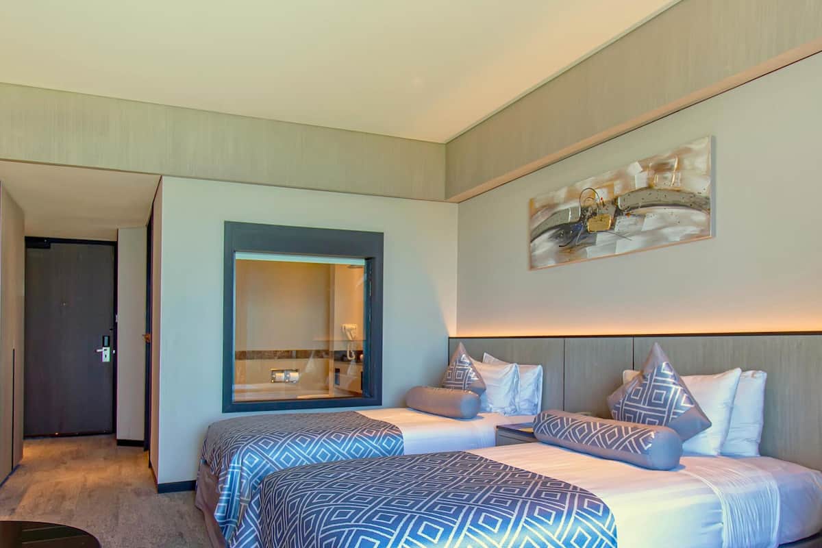 Chambre Deluxe, vue mer | Matelas mémoire de forme, minibar, coffres-forts dans les chambres