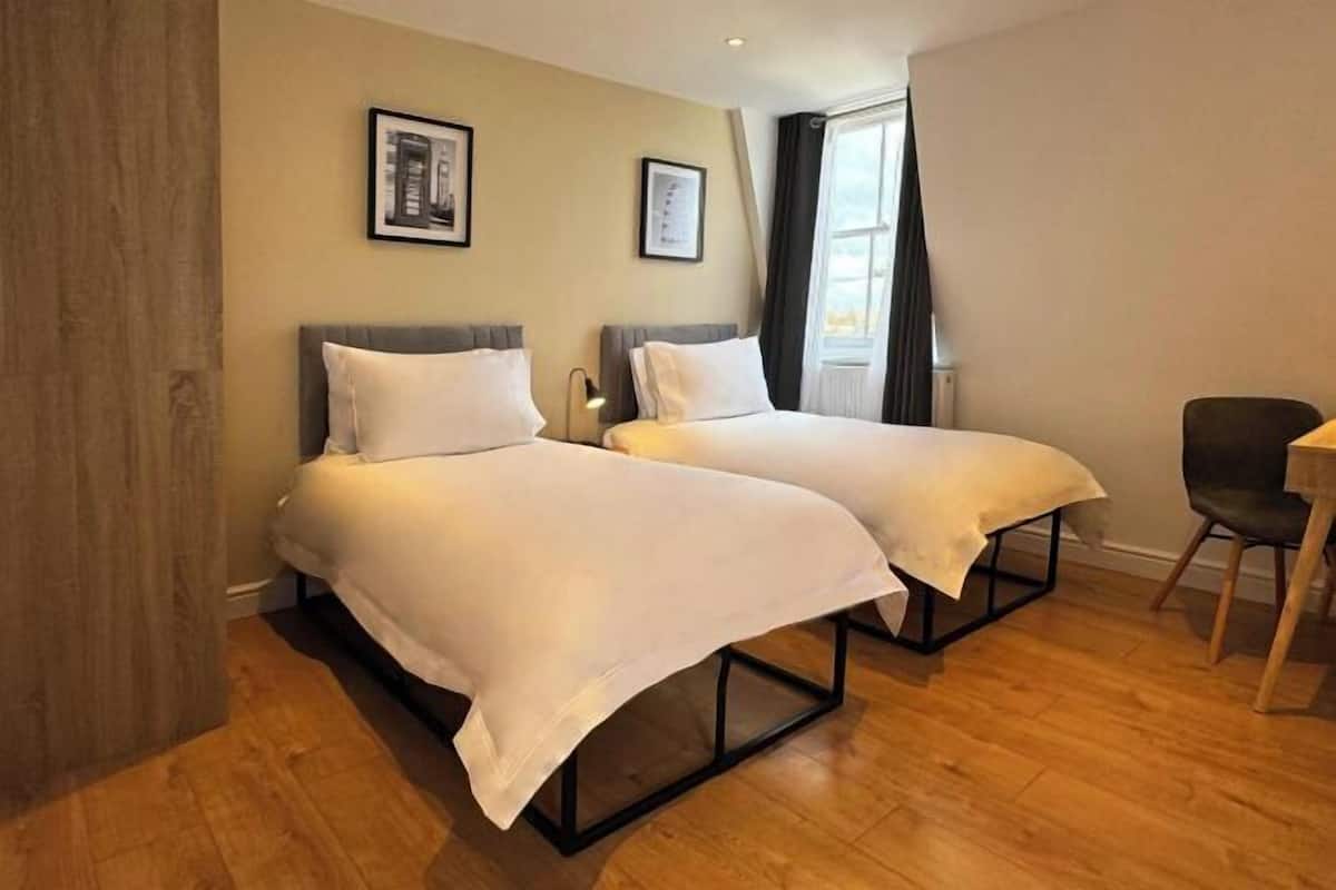 In-room safe, desk, laptop workspace, blackout curtains