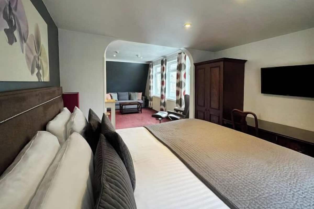 In-room safe, desk, laptop workspace, blackout curtains