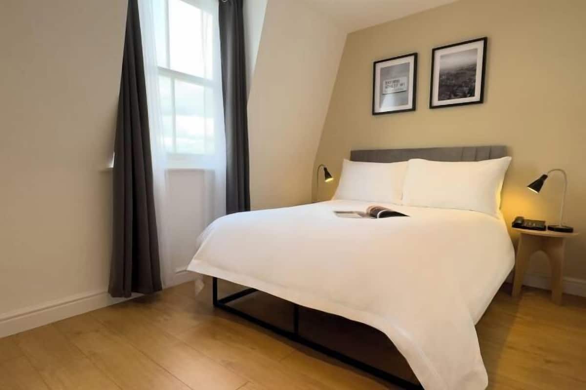 In-room safe, desk, laptop workspace, blackout curtains