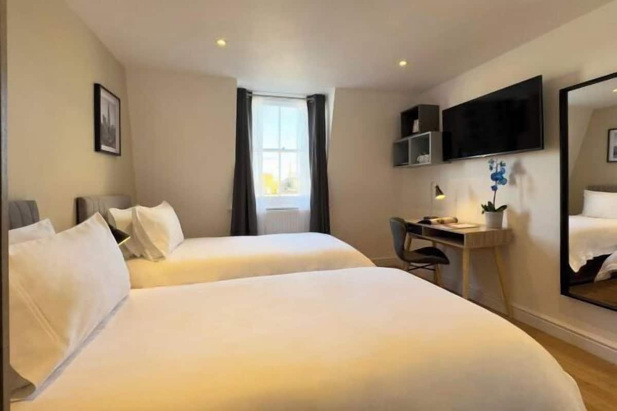 In-room safe, desk, laptop workspace, blackout curtains