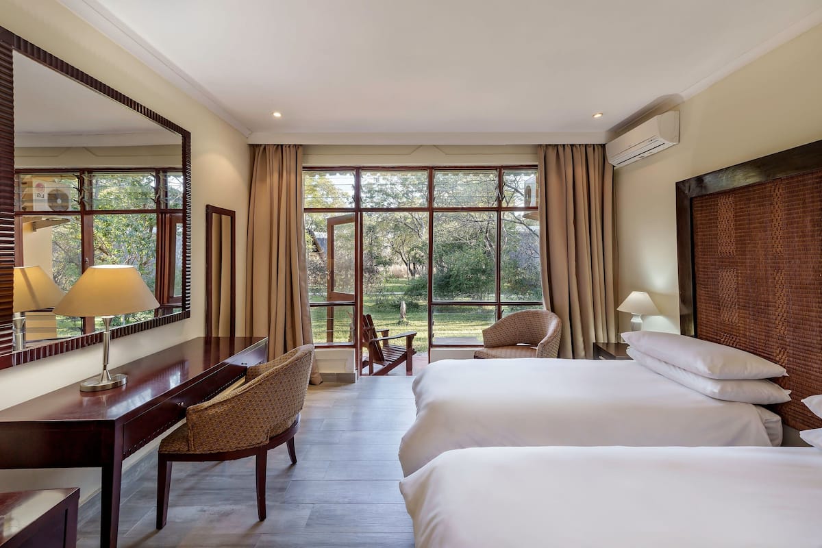 room, 2 single beds | down duvets, minibar, in-room safe, desk