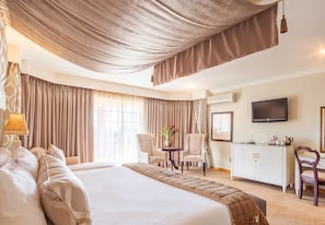 Hotel Suite | Premium bedding, in-room safe, desk, laptop workspace