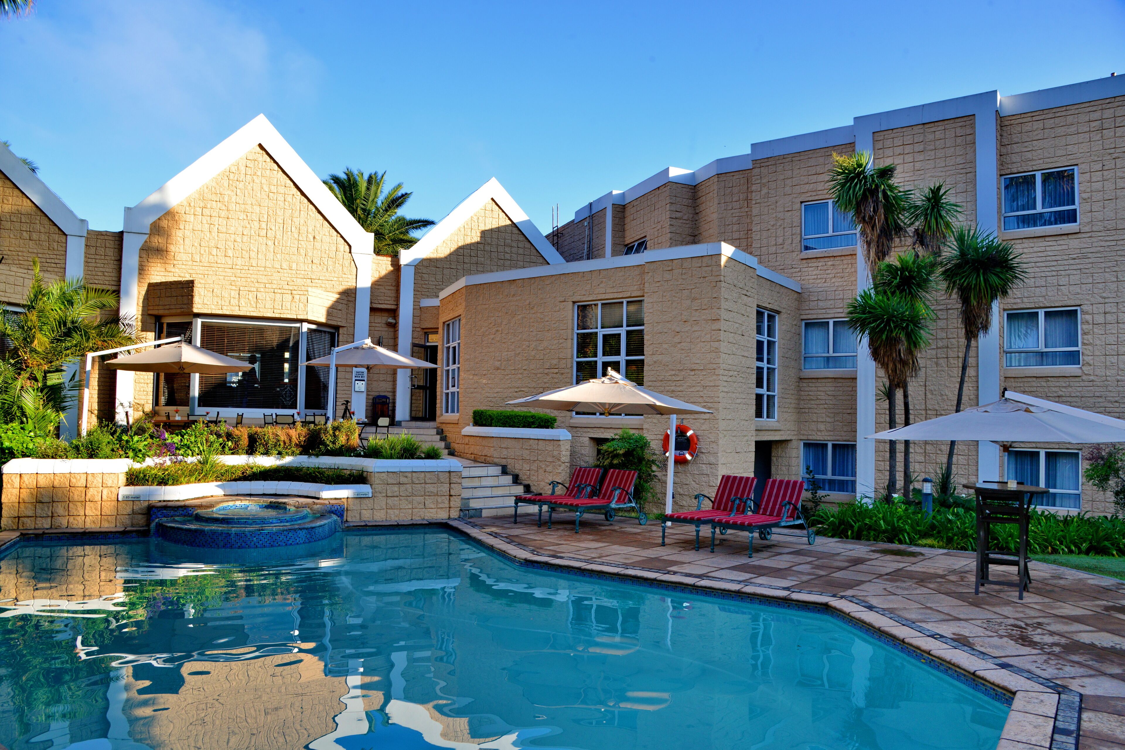 outdoor pool, pool loungers