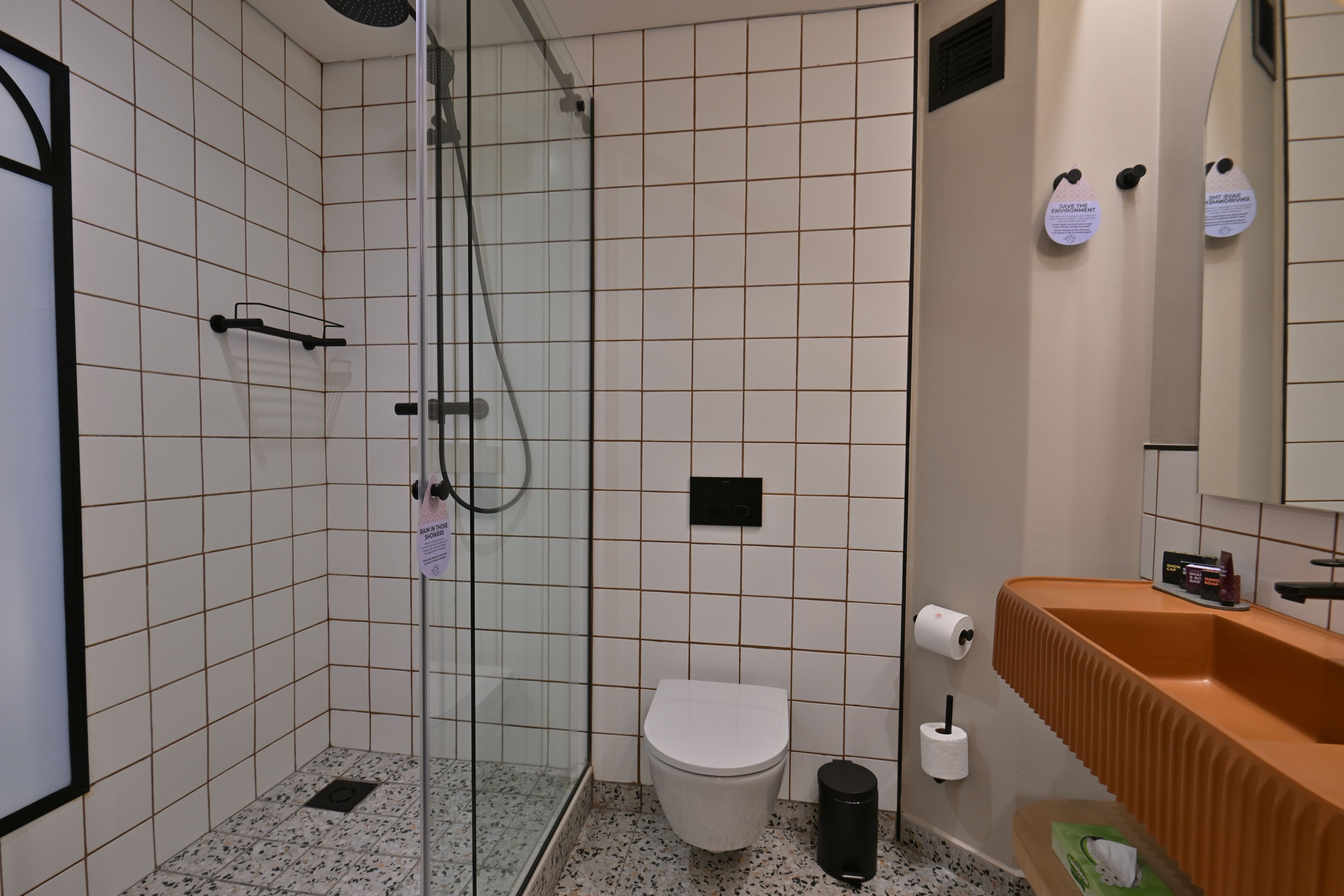 separate bathtub and shower, deep-soaking bathtub, free toiletries