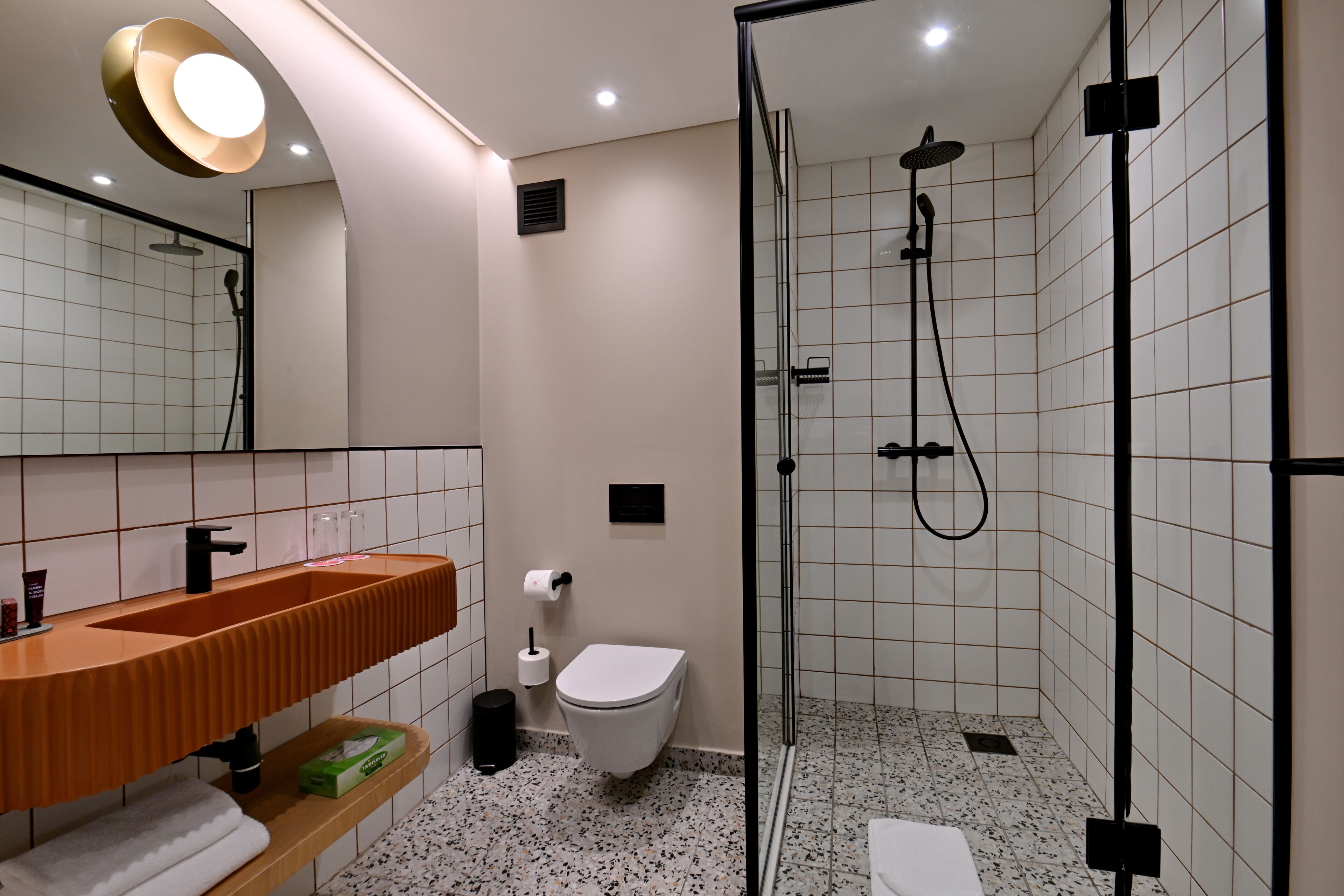 separate bathtub and shower, deep-soaking bathtub, free toiletries