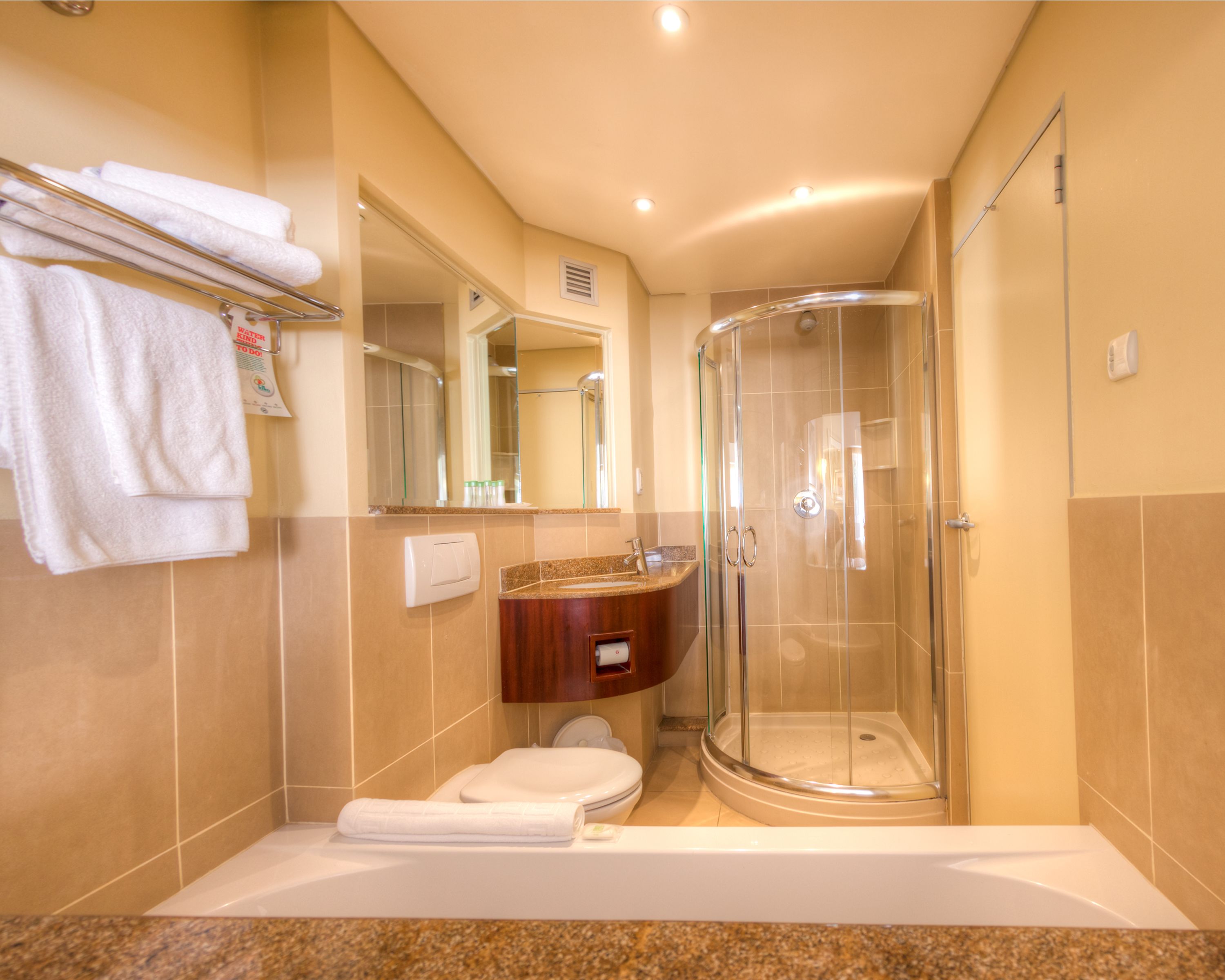 separate bathtub and shower, free toiletries, hair dryer, towels