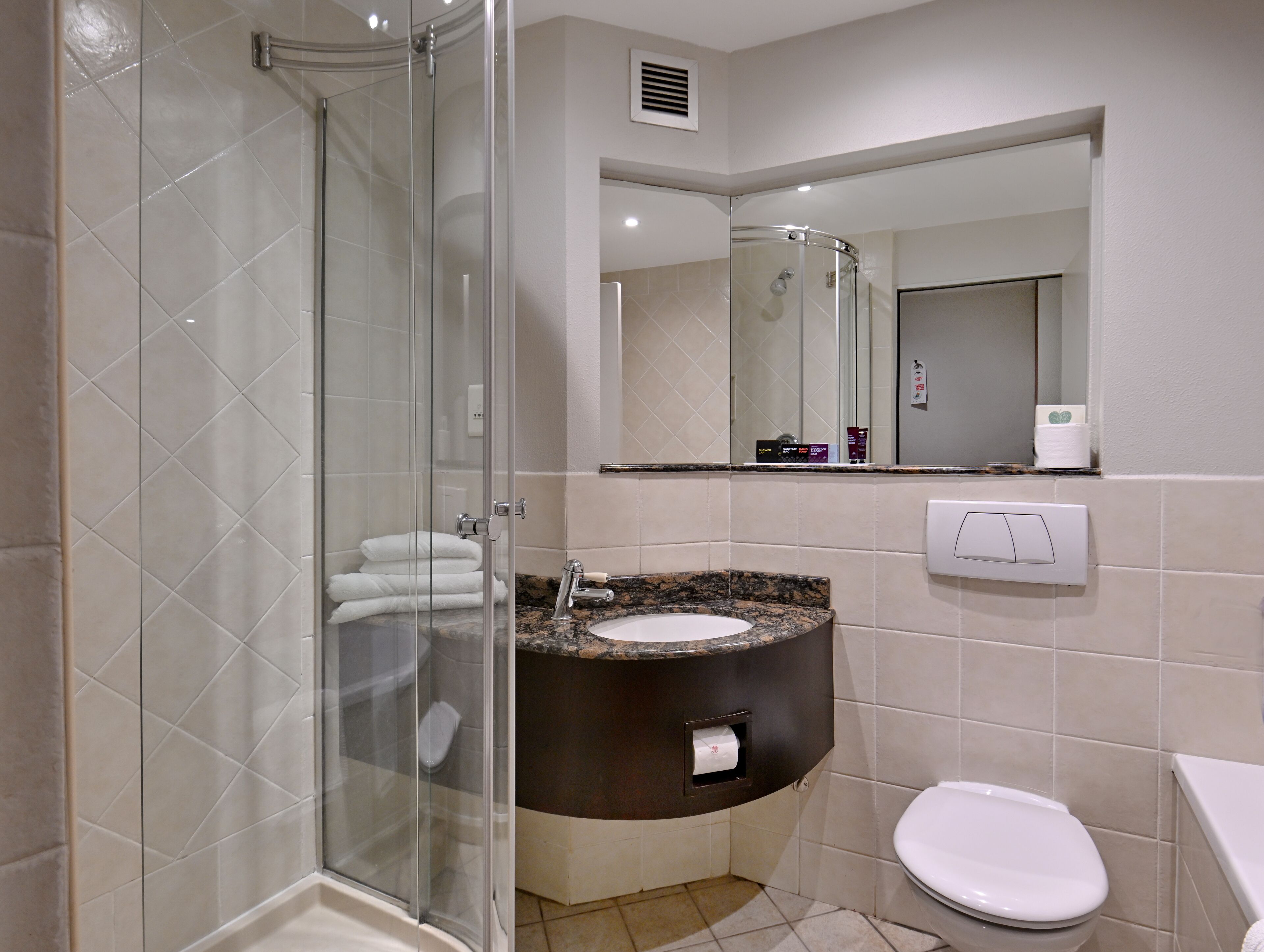 separate bathtub and shower, free toiletries, hair dryer, towels