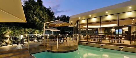 Outdoor pool, open 6 AM to 9 PM, pool umbrellas, sun loungers