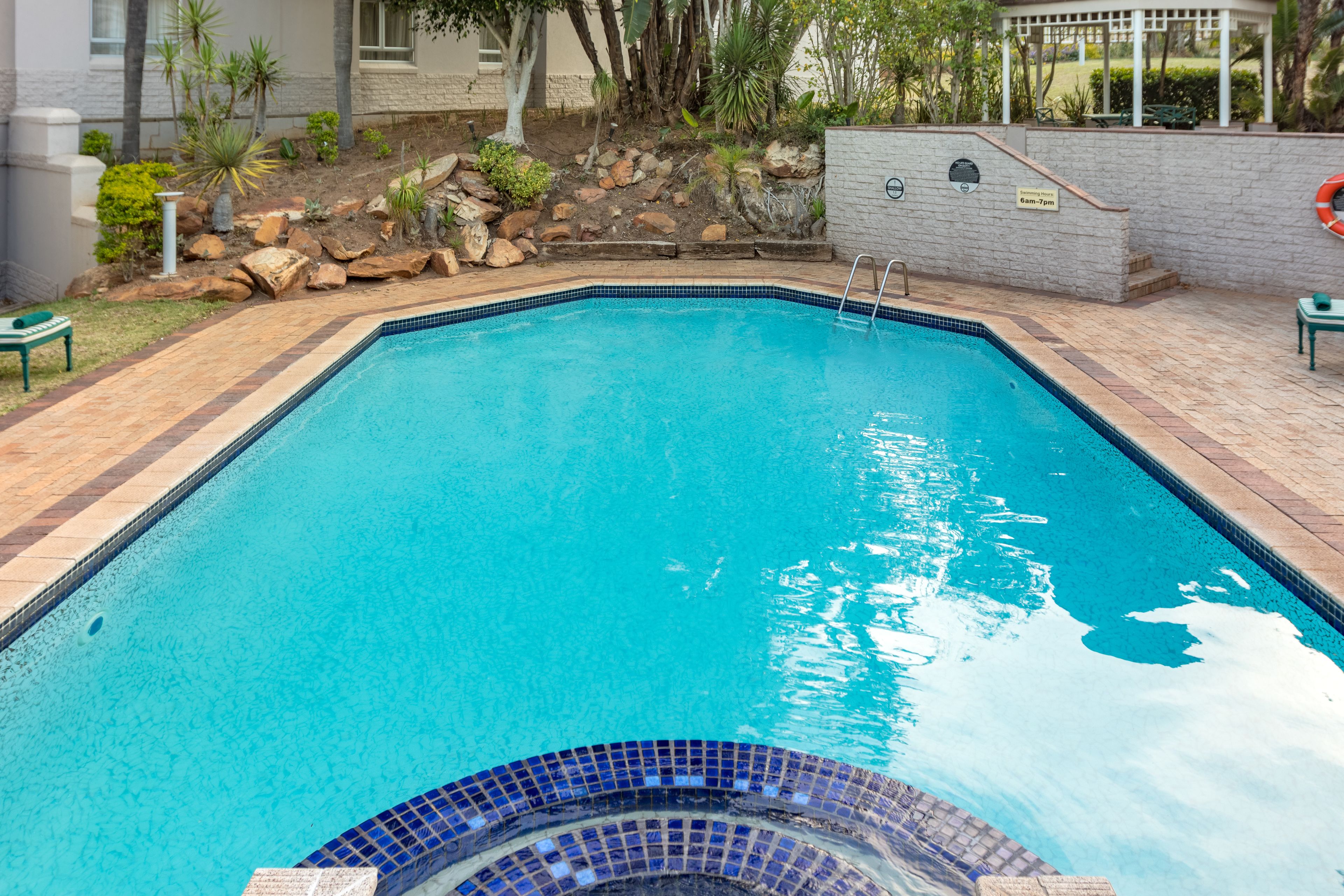 outdoor pool, pool loungers