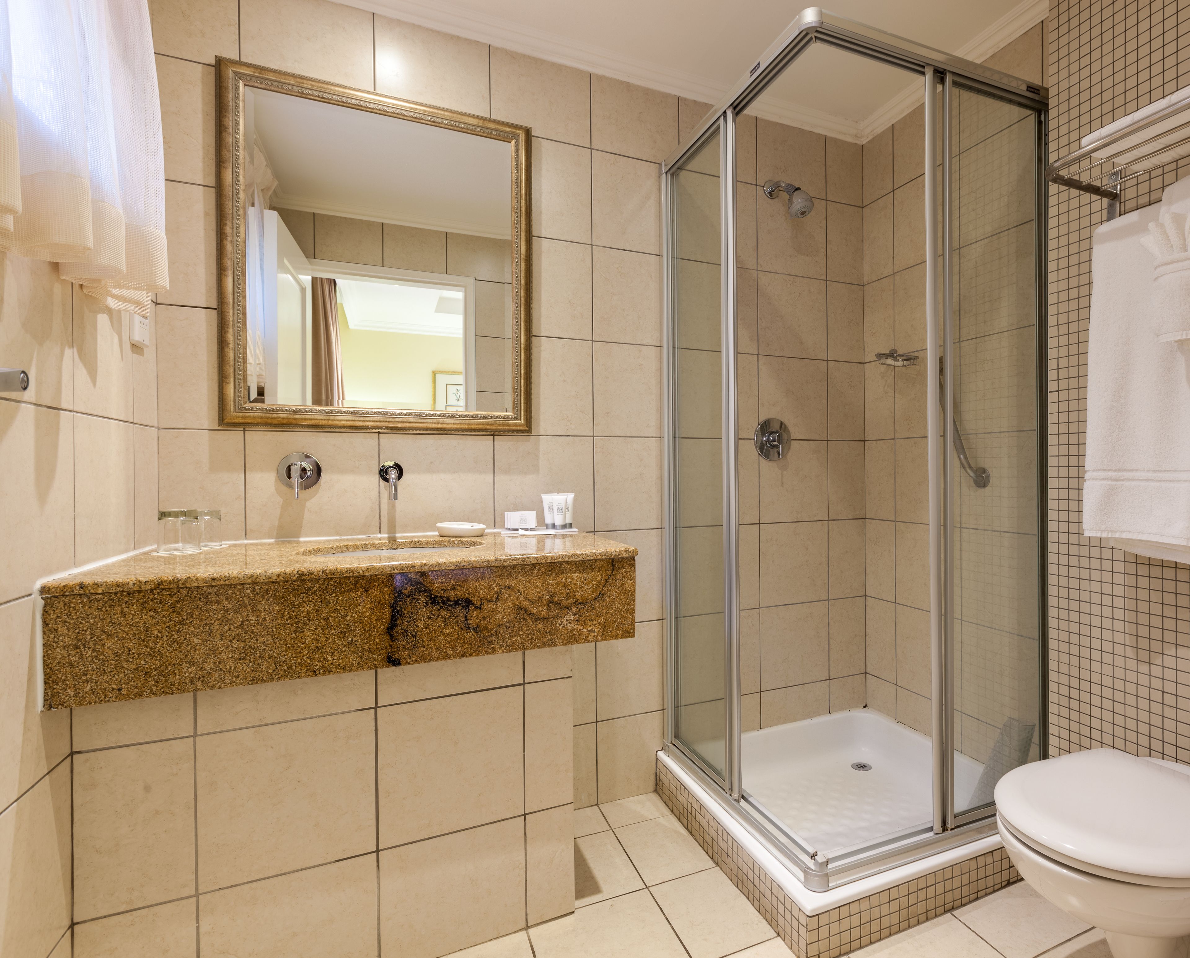 separate bathtub and shower, rainfall showerhead, free toiletries