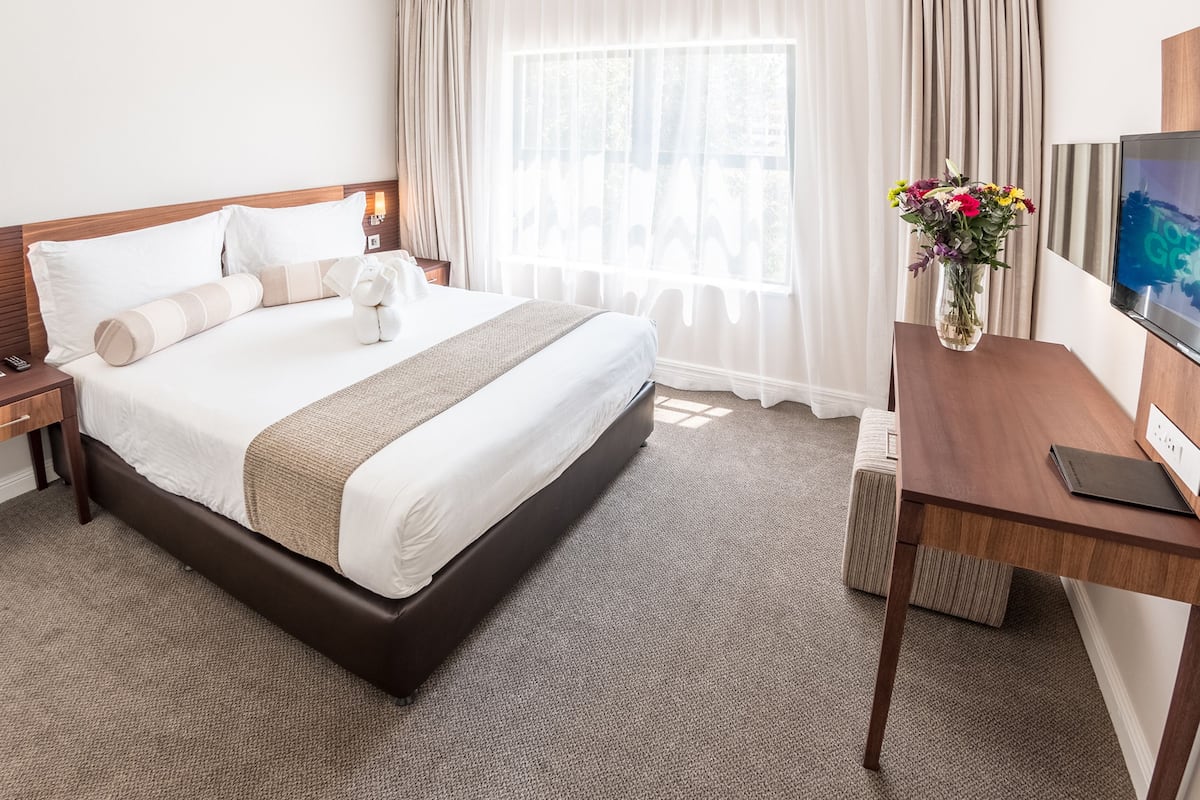 In-room safe, desk, laptop workspace, blackout curtains