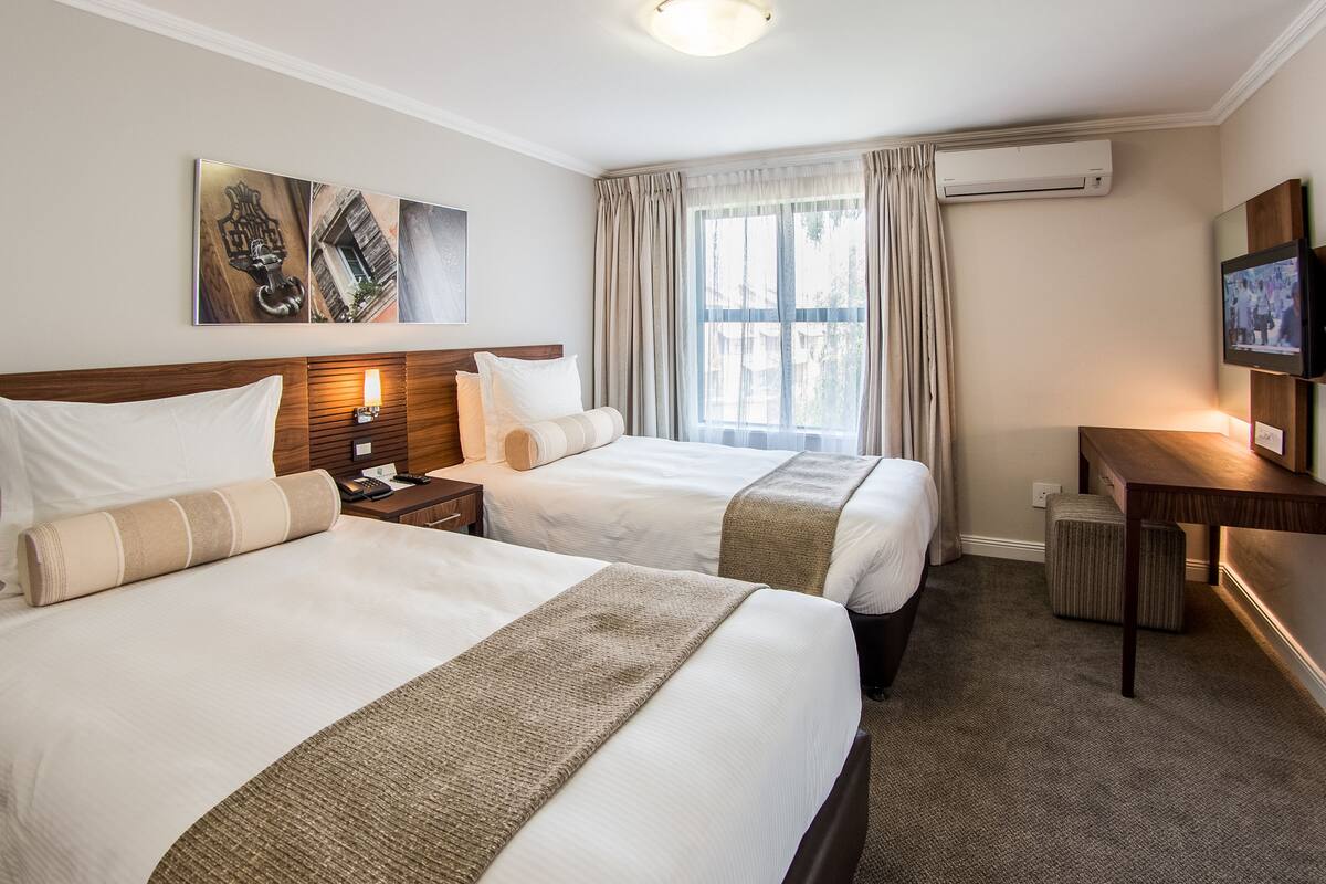In-room safe, desk, laptop workspace, blackout curtains