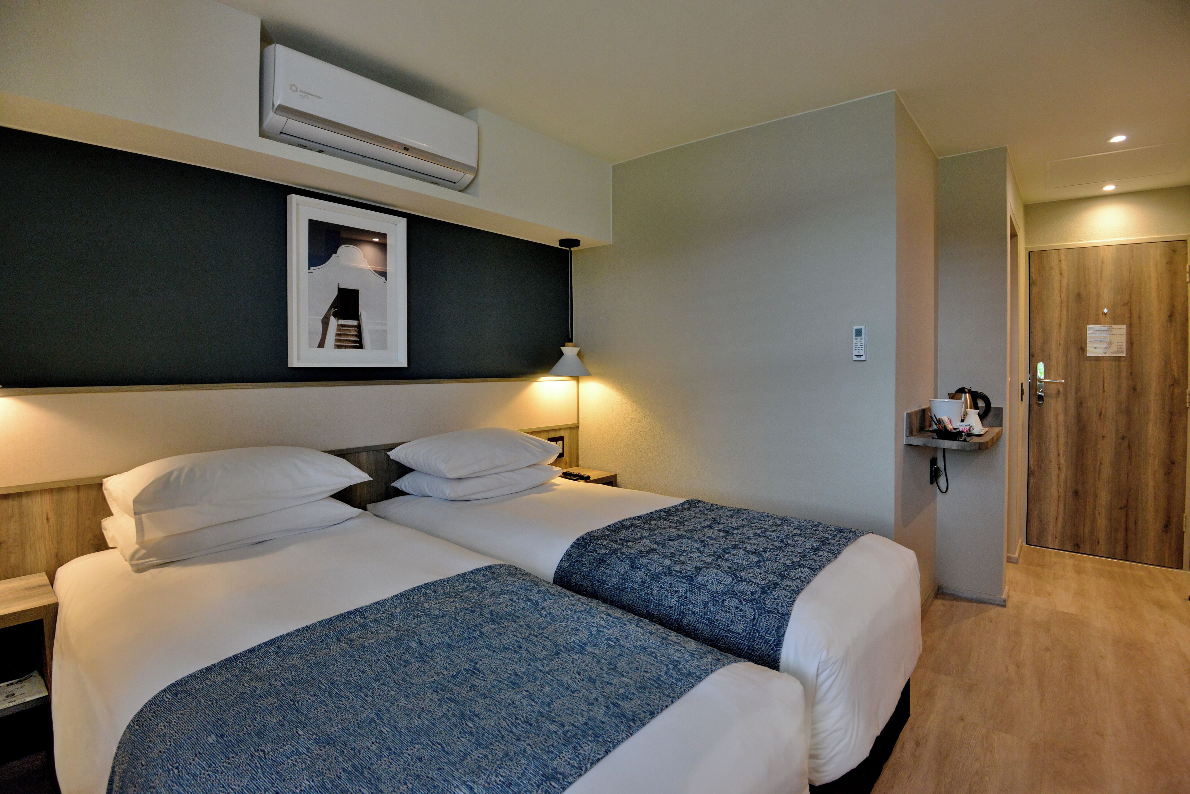 twin room, non smoking | in-room safe, desk, laptop workspace, blackout curtains