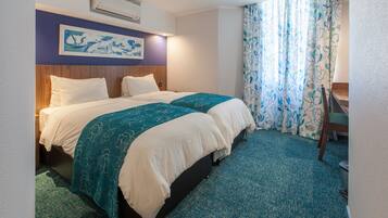 A hotel room with a double bed, a desk, a chair, and a large window with curtains.