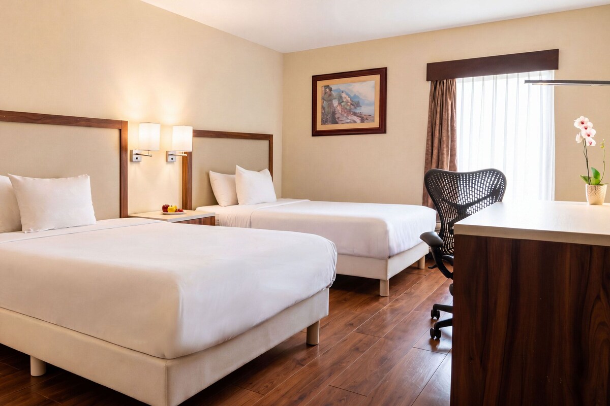 Premium bedding, down comforters, minibar, in-room safe