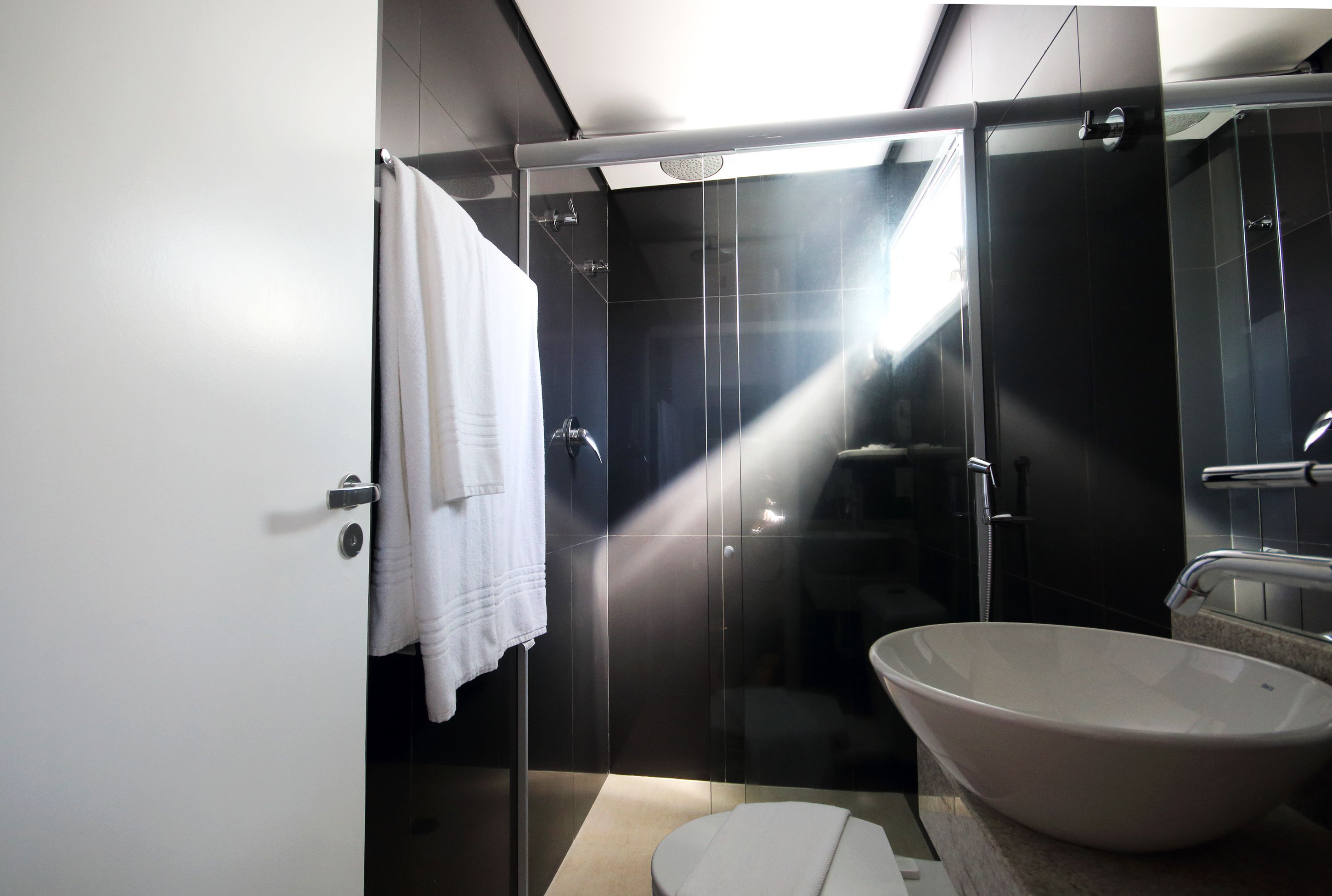 premium studio | bathroom | shower, towels