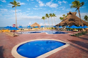 5 outdoor pools, pool umbrellas, sun loungers - Grand Decameron Complex Bucerias, A Trademark All Inclusive (Bucerías)