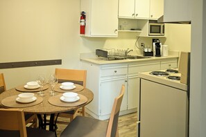One Bedroom Apartment with Balcony, Robson Street | Private kitchen | Microwave, coffee/tea maker, electric kettle, toaster - Hotel Opportune (Vancouver)
