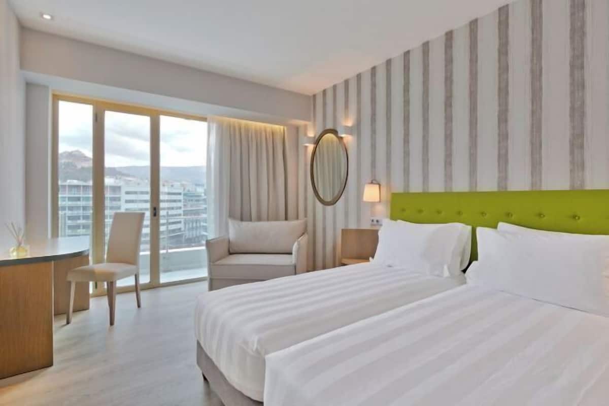 Premium bedding, in-room safe, desk, blackout curtains