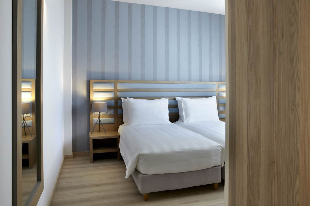 Premium bedding, in-room safe, desk, blackout curtains