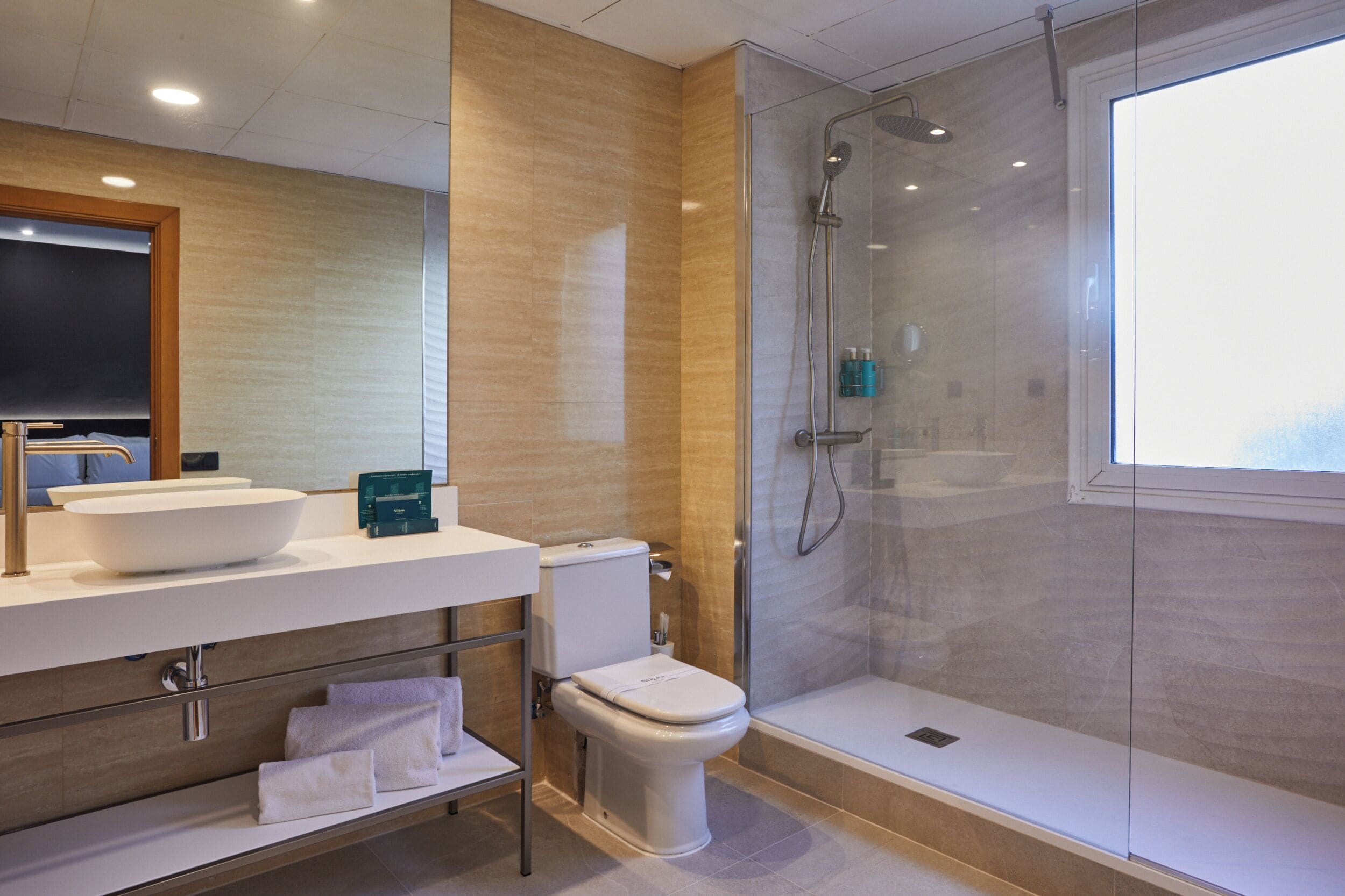 free toiletries, hair dryer, bidet, towels