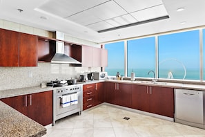 Premium Four-Bedroom Suite Sea View | Private kitchen | Coffee/tea maker, electric kettle, toaster