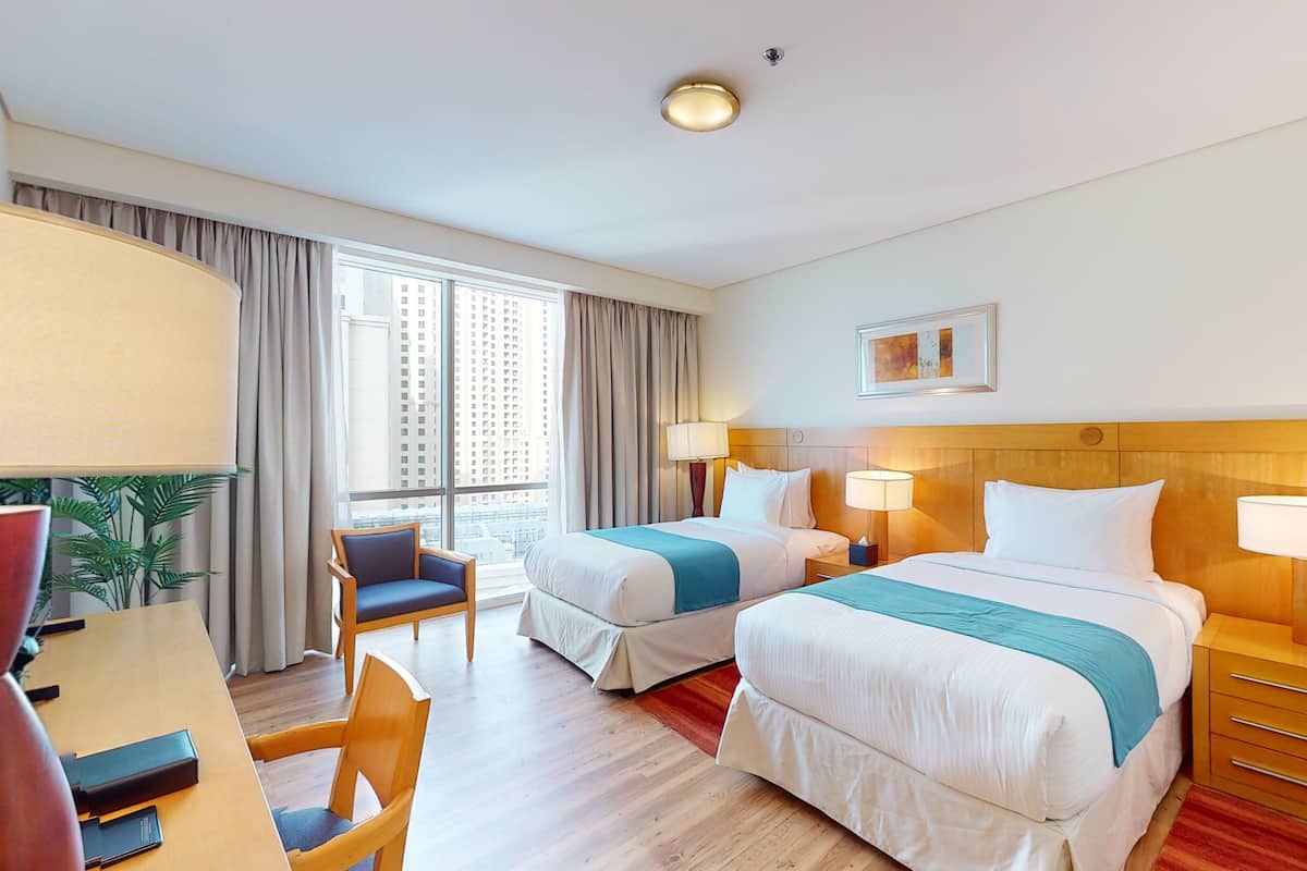 2 bedrooms, premium bedding, in-room safe, desk