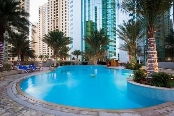 2 outdoor pools, pool umbrellas, pool loungers