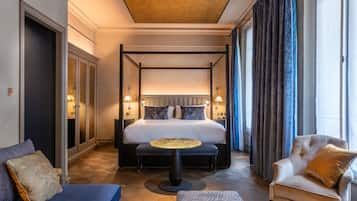 Junior Suite | 1 bedroom, in-room safe, individually decorated, blackout drapes