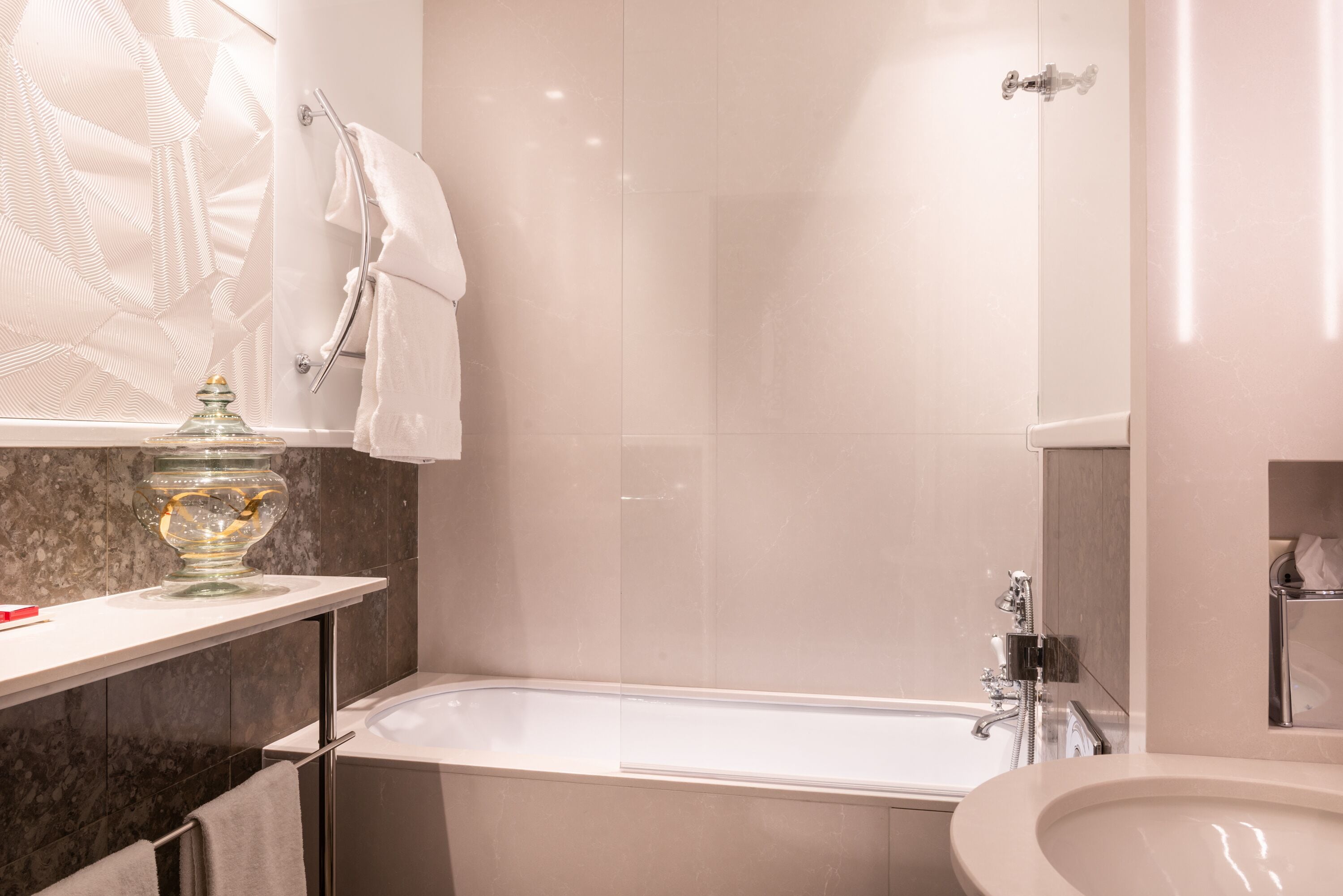 designer toiletries, hair dryer, bathrobes, slippers