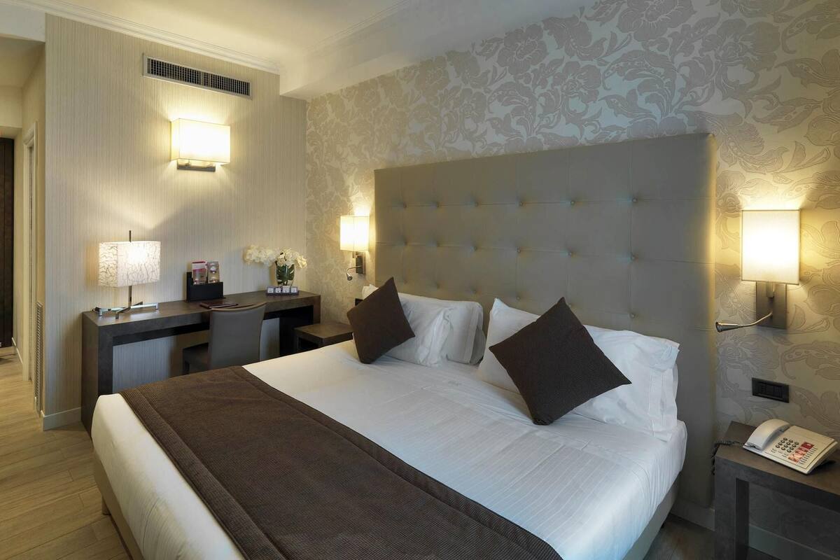 Hypo-allergenic bedding available, minibar (free items), in-room safe