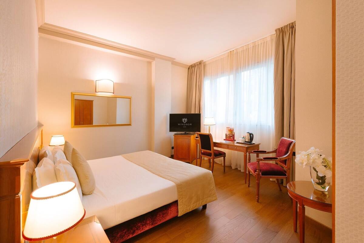 Hypo-allergenic bedding, free minibar, in-room safe, desk