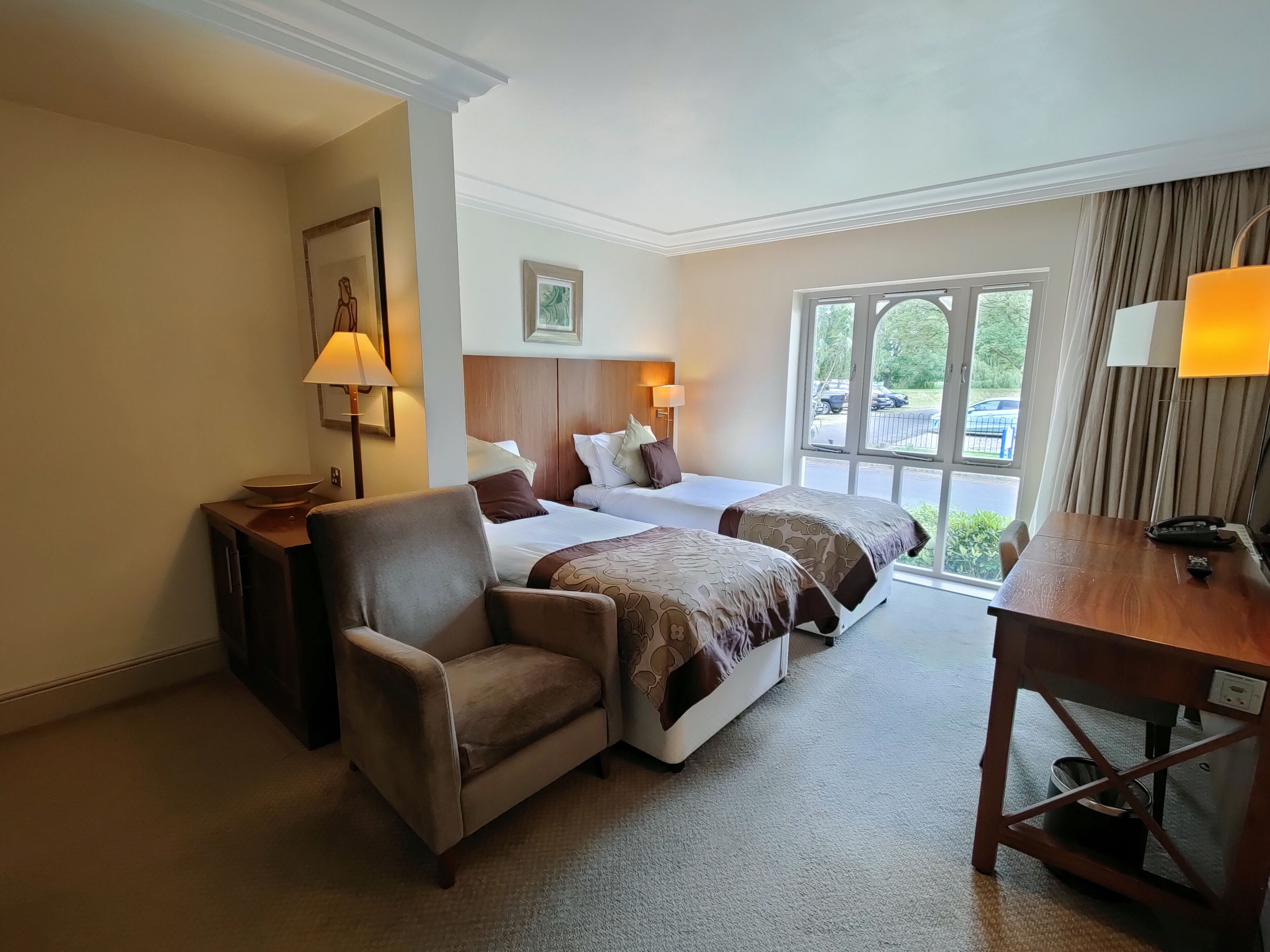 executive twin room, main house | in-room safe, individually decorated, desk, laptop workspace