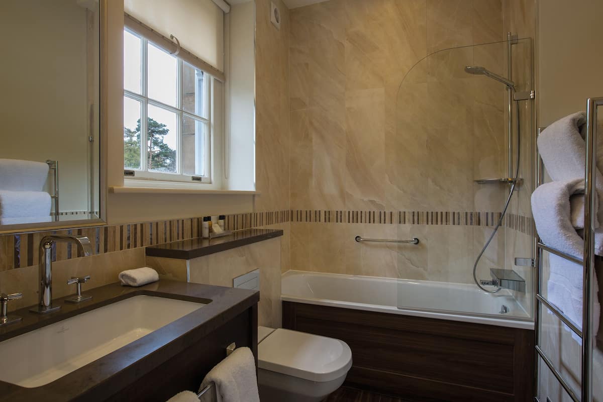 classic double room | in-room safe, individually decorated, desk, blackout curtains