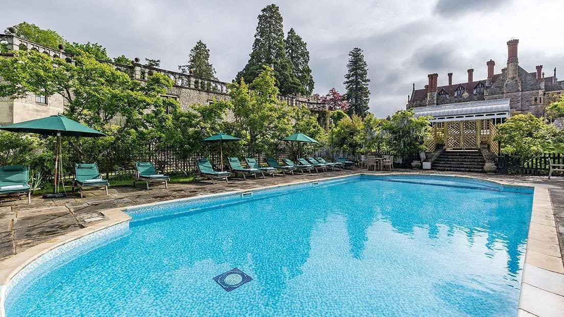 seasonal outdoor pool, pool umbrellas, pool loungers