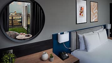 Room, 1 King Bed | In-room safe, desk, iron/ironing board, free WiFi