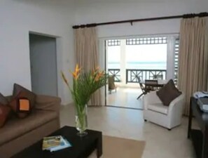 Suite, 2 Bedrooms, Oceanfront | Premium bedding, in-room safe, iron/ironing board - Silverpoint Hotel (Silver Sands)