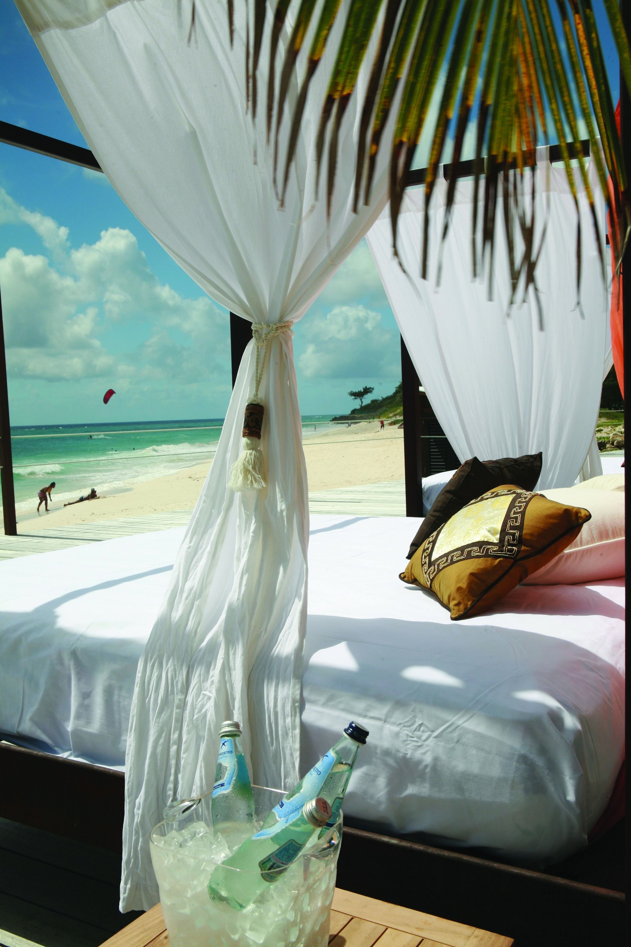 On the beach, white sand, free beach cabanas, sun loungers