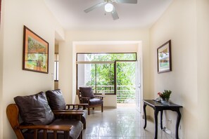 Standard Apartment (Arrecifes 6) | Living area | Flat-screen TV