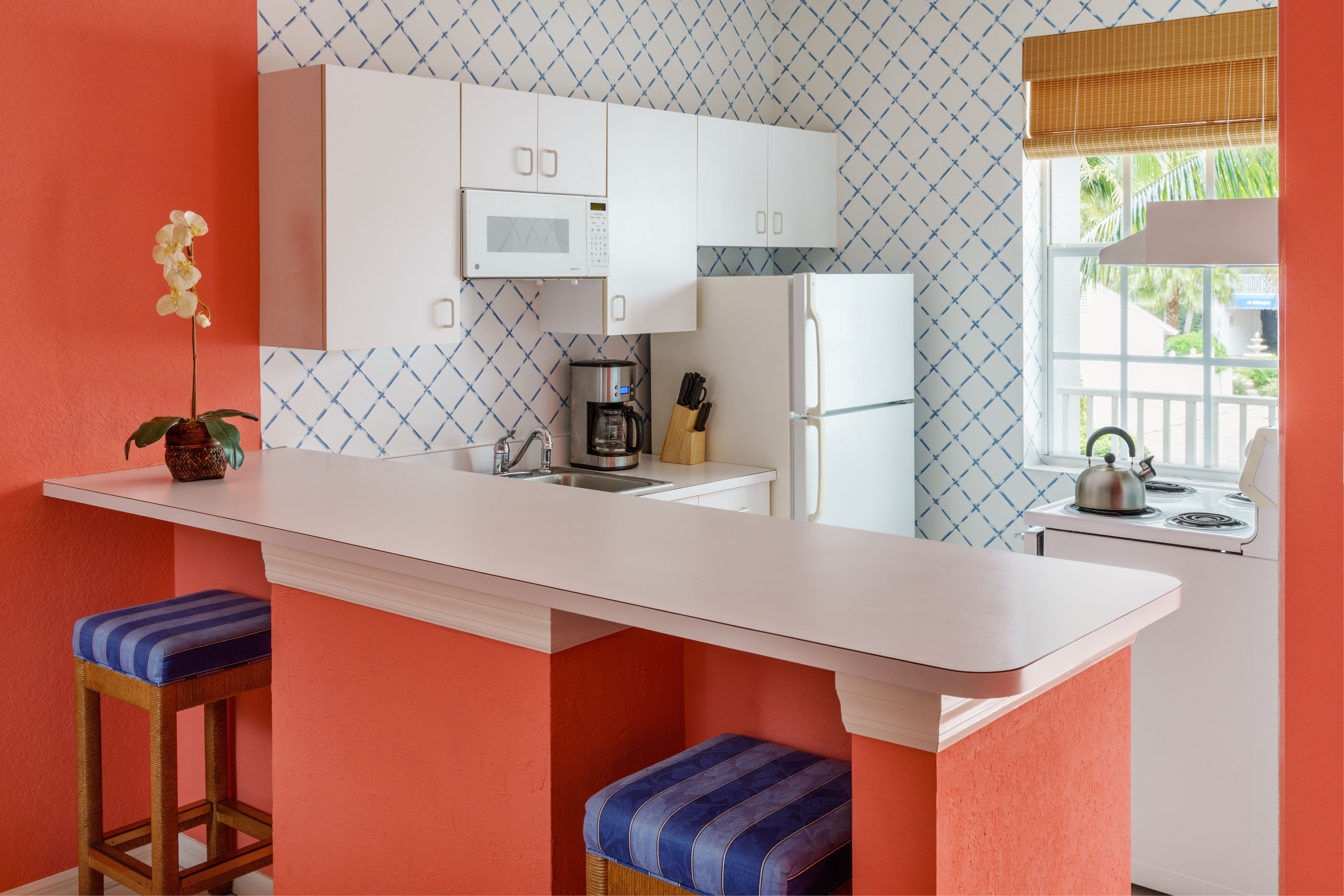 fridge, microwave, coffee/tea maker, cookware/dishes/utensils