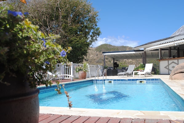 Outdoor pool, pool umbrellas, pool loungers