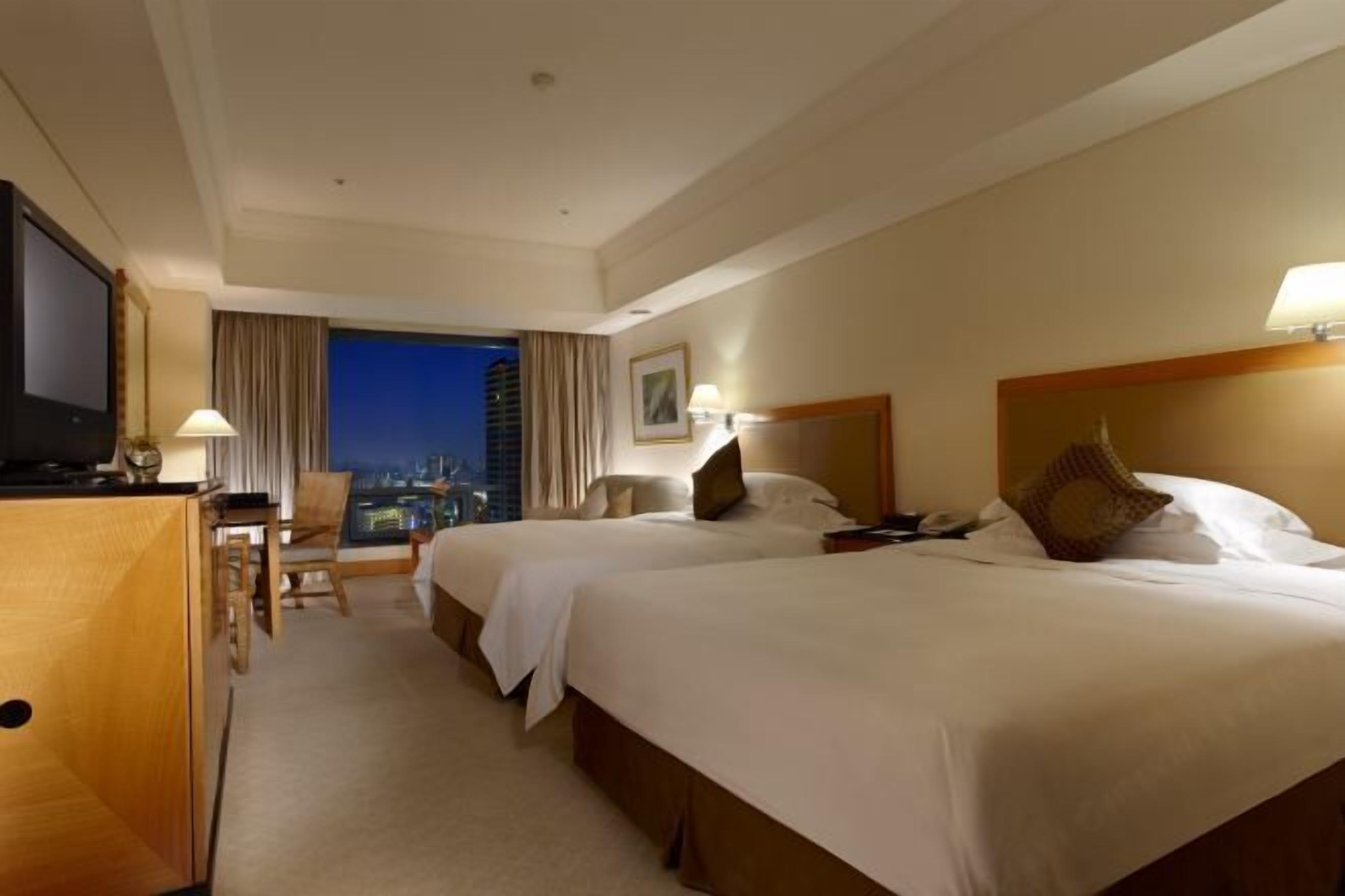 Premium bedding, down duvets, in-room safe, desk